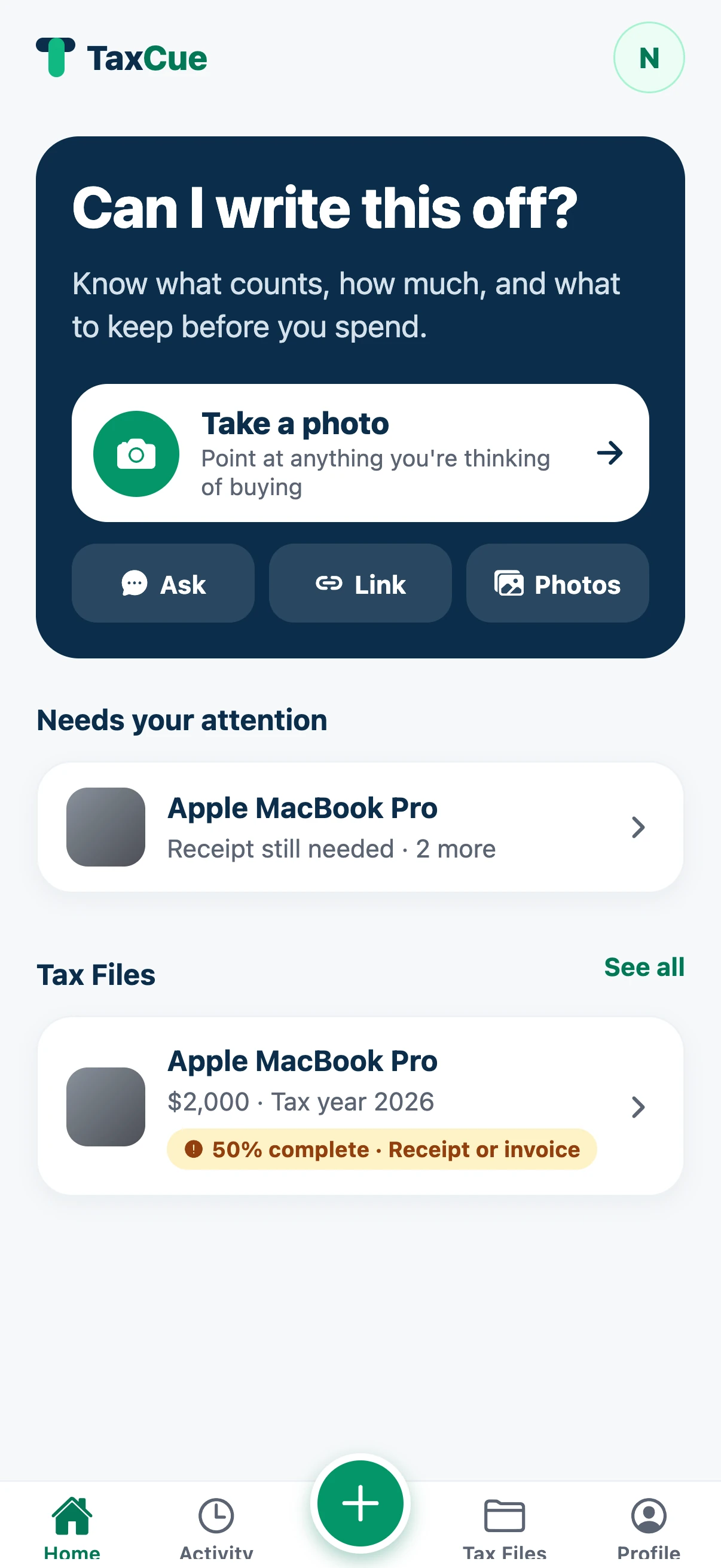 TaxCue home screen asking “Can I write this off?” with options to take a photo, ask, paste a link or choose photos.